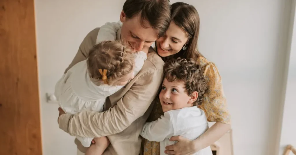 Family celebrating a warm and supportive relationship built through positive parenting.