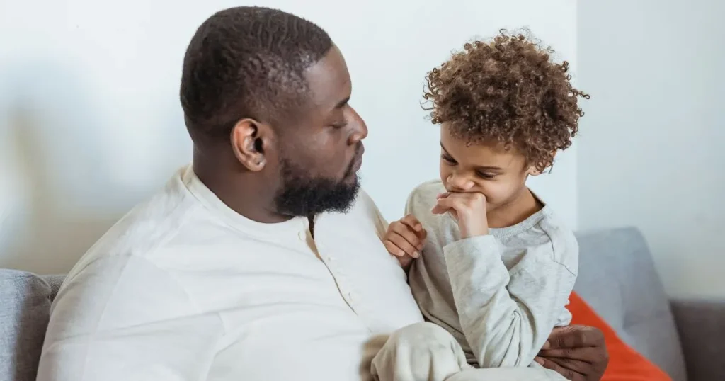 Parent staying calm while responding to a child's frustration.