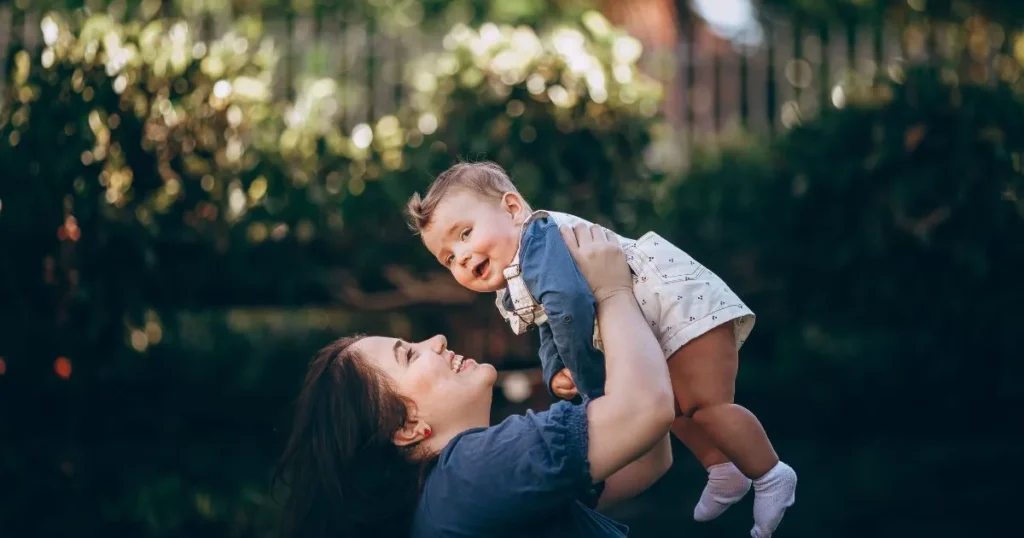Mother hugging her child during a peaceful moment outdoors