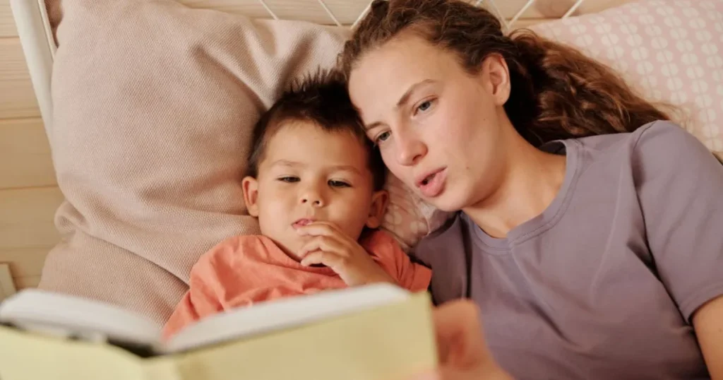 Parent reading with a child to encourage learning and emotional connection.
