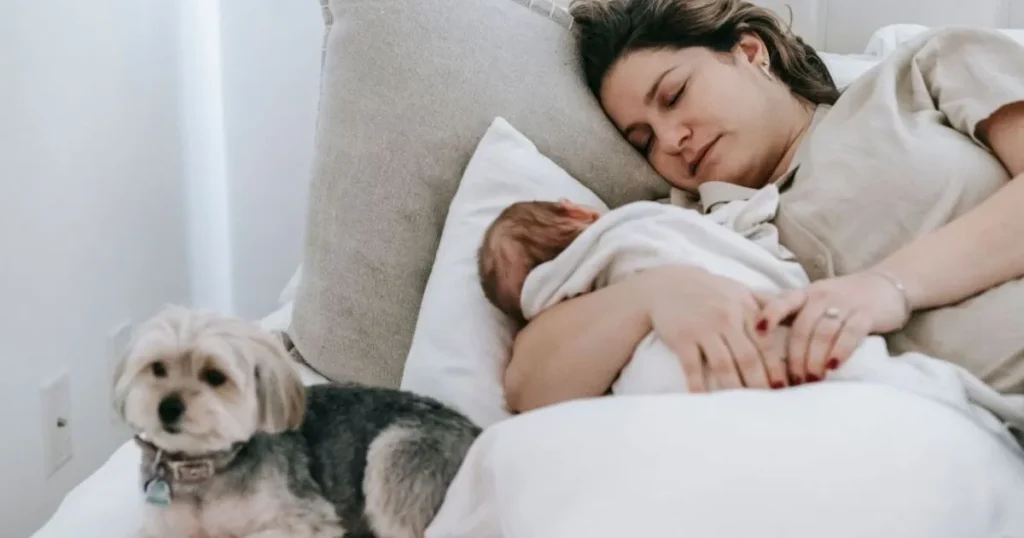 Mother soothing a crying baby during a nighttime wake-up
