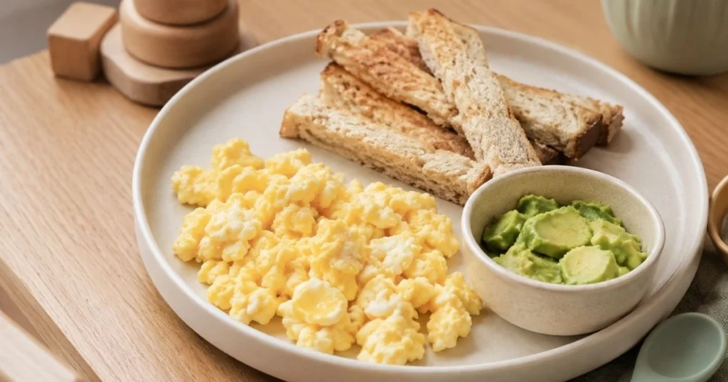 Scrambled eggs and toast strips for toddlers