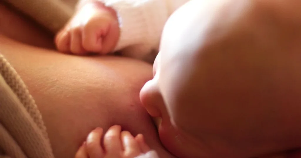 How Much Breastmilk at 3 Months? A Complete Guide 3 A baby is breastfeeding safely