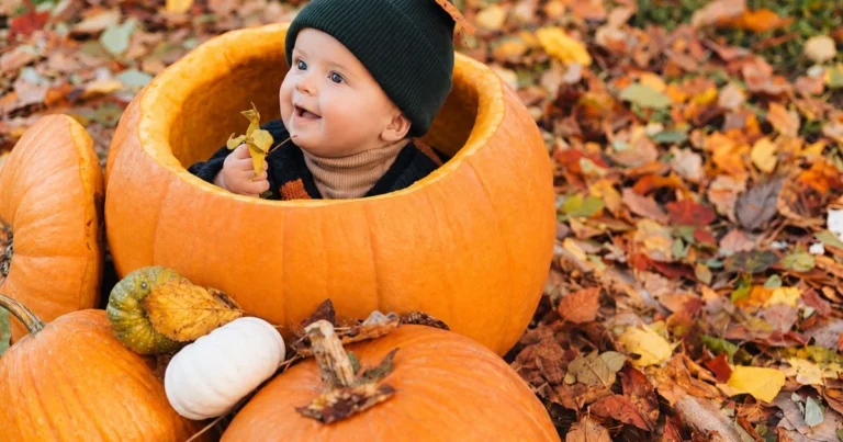 baby in pumpkin