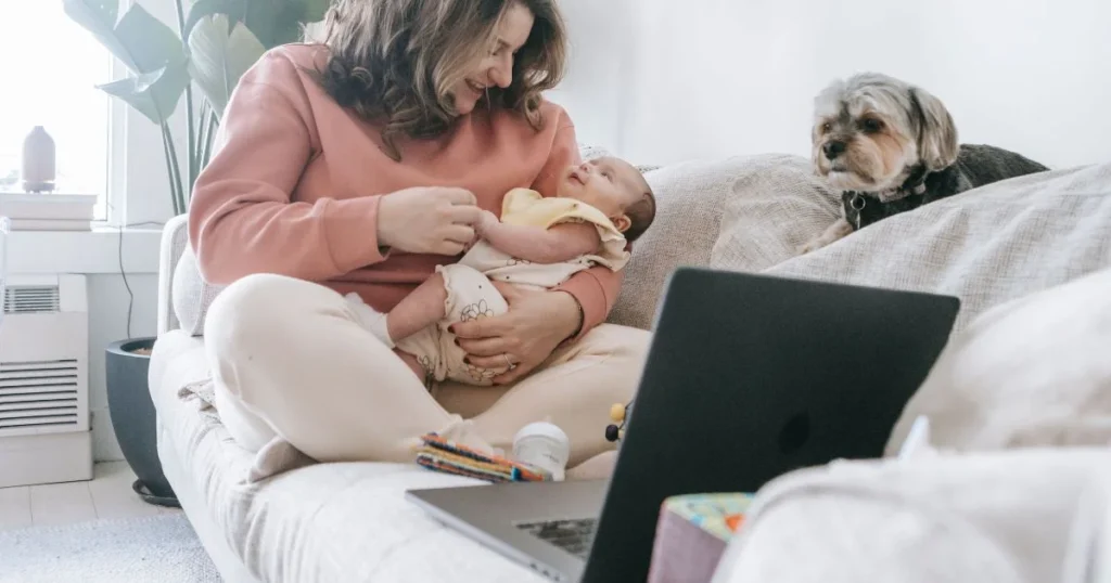 Postpartum Depression Help Groups: How to Find Support 5 New mother participating in an online postpartum support group from home